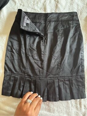 Black Pleated-Hem Mini Skirt with Front Paneling
